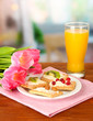 Tasty canapes with cheese, kiwi and cranberry, almond,