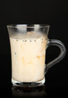 Photo: Cold coffee with ice in glass isolated on black Cold coffee with ice in glass isolated on black
