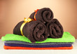 Colorful towels, on brown background