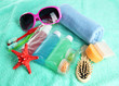 Photo: Hotel cosmetics kit on blue towel Hotel cosmetics kit on blue towel