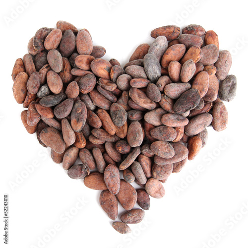 Photo: Cocoa beans isolated on white Cocoa beans isolated on white