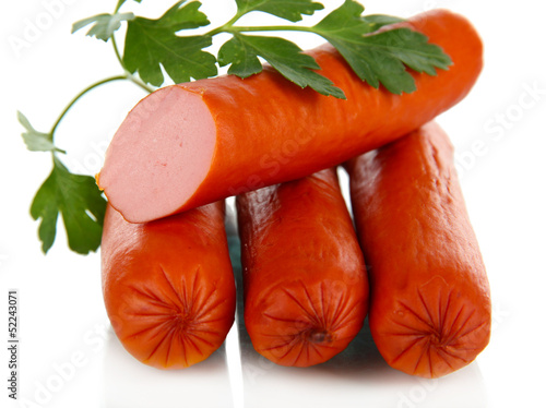 Photo: Yummy Sausages isolated on white Yummy Sausages isolated on white