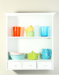 Kitchen utensils on beautiful white shelves
