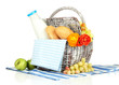 Picnic basket with fruits and bottle of milk, isolated on white