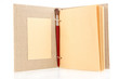 Photo: Beautiful old notebook isolated on white Beautiful old notebook isolated on white