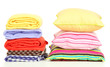 Photo: Bright pillows and plaids, isolated on white Bright pillows and plaids, isolated on white