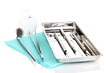 Photo: Dentist tools isolated on white Dentist tools isolated on white