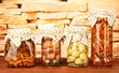 Delicious marinated mushrooms in glass jars,