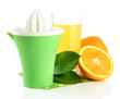 Citrus press, glass of juice and ripe oranges, isolated on