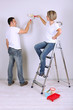 Young couple doing renovation together.