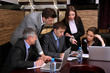 Photo: Business people working in conference room Business people working in conference room