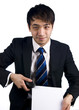 Asian businessman with stapler