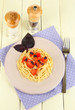 Photo: Spaghetti with tomatoes and basil leaves Spaghetti with tomatoes and basil leaves