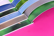Many bright open magazines close-up