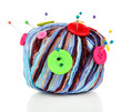 Colorful buttons and multicolor wool ball, isolated on white
