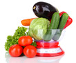 Fresh vegetables in scales isolated on white