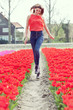 beauty young woman with flowers tulips