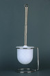 Toilet brush on grey background