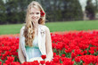 beauty young woman with flowers tulips