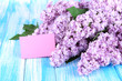 Beautiful lilac flowers on table close-up