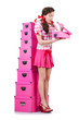 Young woman with storage boxes on white