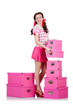 Foto: Young woman with storage boxes on white Young woman with storage boxes on white