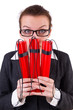 Businesswoman with dynamite on white