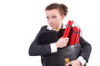 Businesswoman with dynamite on white