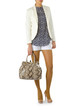 Woman in fashion dress concept on white