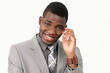 Amused office guy looking over glasses