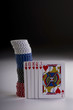 Poker hand with chips.