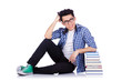 Student with lots of books on white