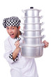 Cook with stack of pots on white