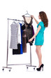 Woman trying new clothing on white