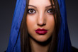 Muslim woman with headscarf in fashion concept