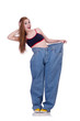 Woman in dieting concept with big jeans