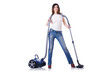 Young woman with vacuum cleaner on white