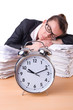 Woman businesswoman with giant alarm clock