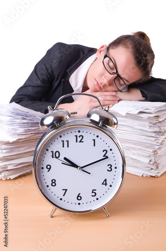 Photo: Woman businesswoman with giant alarm clock Woman businesswoman with giant alarm clock
