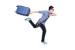 Young guy with travel case on white