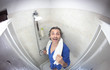 man in bathrobe, fish eye view