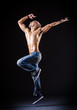 Dancer dancing in the dark studio