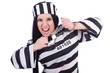 Prisoner in striped uniform on white