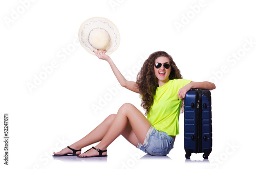 Photo: Young woman ready for summer vacation on white Young woman ready for summer vacation on white