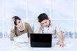Photo: Asian couple having difficulty paying bills online Asian couple having difficulty paying bills online