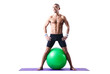 Man With Swiss Ball Doing Exer...