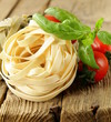 types of pasta on a wooden table