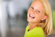 Foto: laughing preteen girl looking back laughing preteen girl looking back