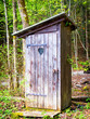 old wooden outhouse