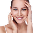 Beauty Portrait. Beautiful Spa Woman Touching her Face